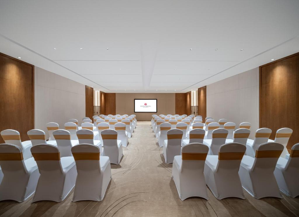 TV a/nebo společenská místnost v ubytování Genpla Hotel Shenzhen Nanshan