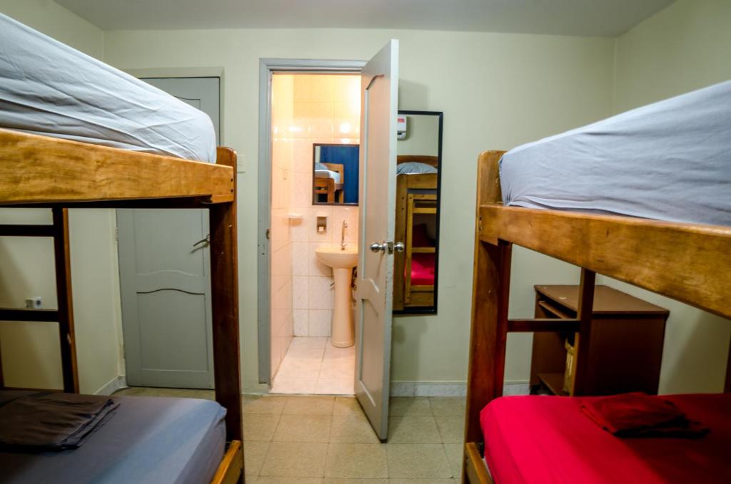Postel nebo postele na pokoji v ubytování Casa Michael