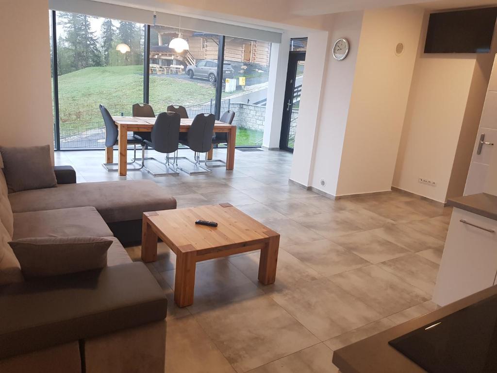 Posedenie v ubytovaní Apartamenty KADO