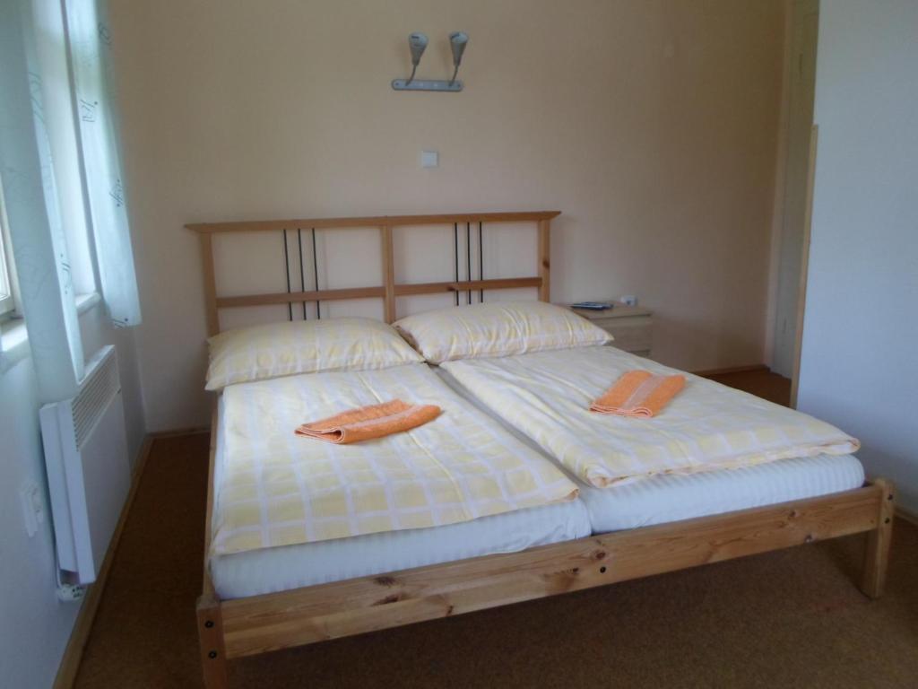 Postel nebo postele na pokoji v ubytování Vila Martin