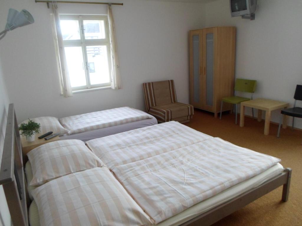 Postel nebo postele na pokoji v ubytování Vila Martin