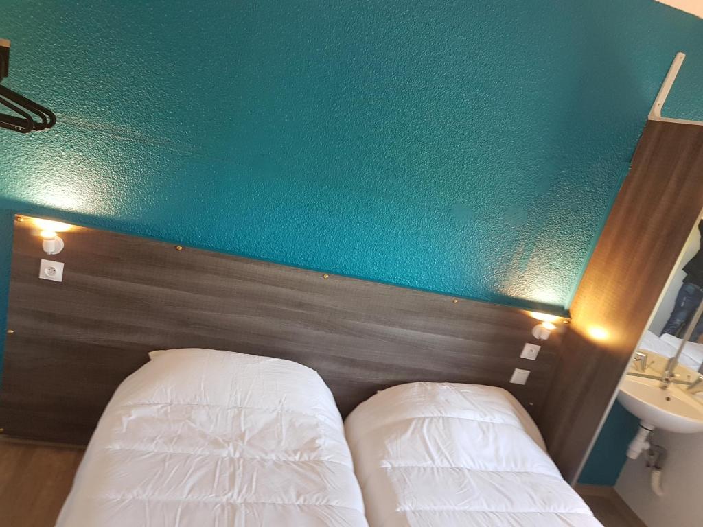 Postel nebo postele na pokoji v ubytování Hôtel Eco Blois -Sud- Vineuil