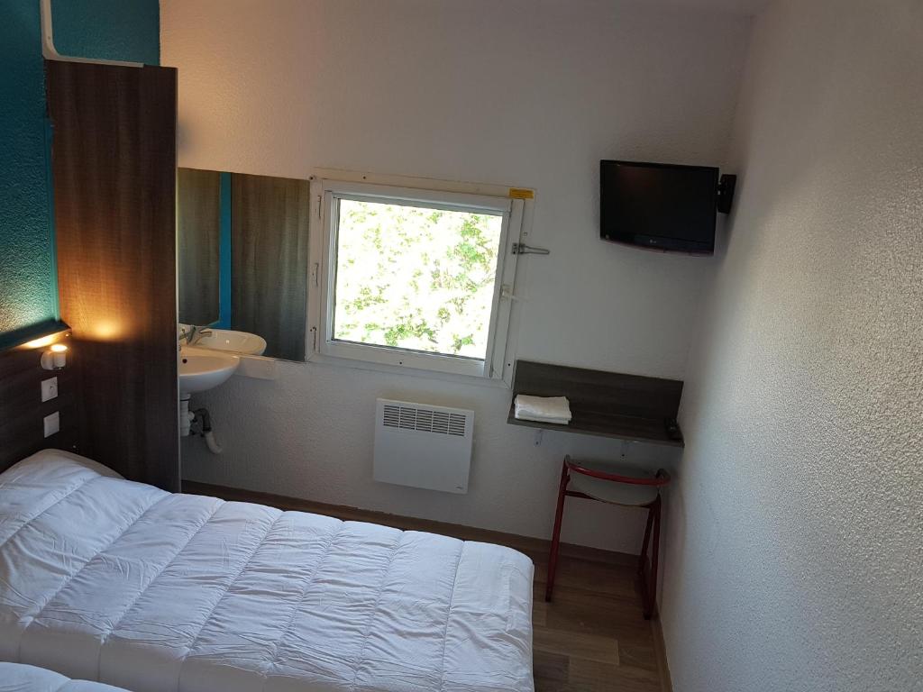 Postel nebo postele na pokoji v ubytování Hôtel Eco Blois -Sud- Vineuil