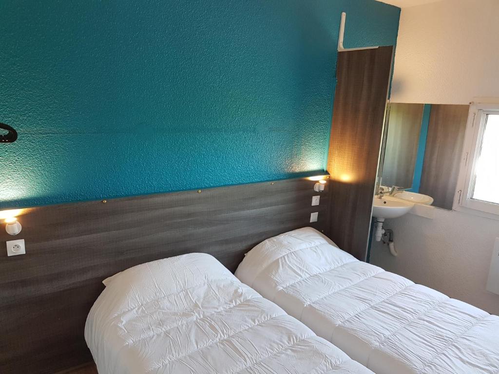 Postel nebo postele na pokoji v ubytování Hôtel Eco Blois -Sud- Vineuil