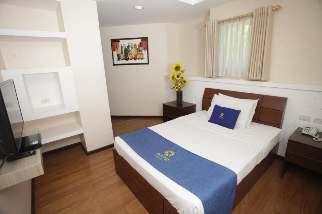 Postel nebo postele na pokoji v ubytování Star Hotel