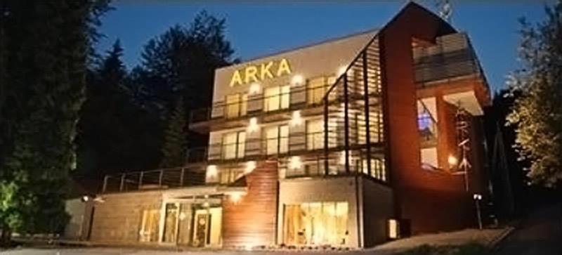 a building with aania written on the side of it at Hotel Arka Spa in Wisła