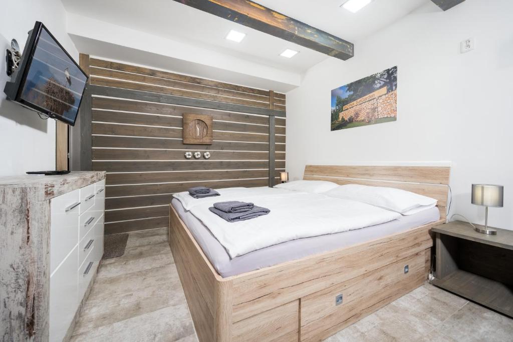 Postel nebo postele na pokoji v ubytování Apartmá SunGarden Liberec