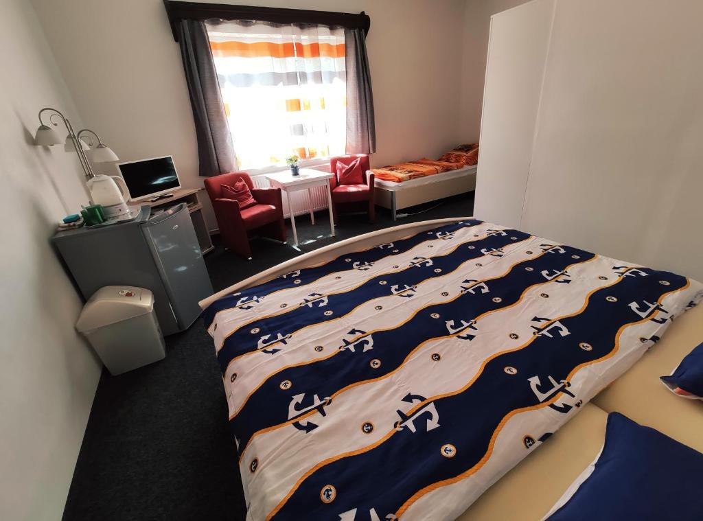 Postel nebo postele na pokoji v ubytování Penzion u Krtka