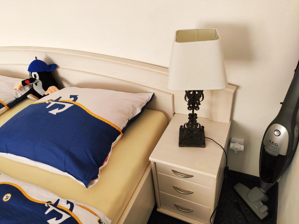 Postel nebo postele na pokoji v ubytování Penzion u Krtka