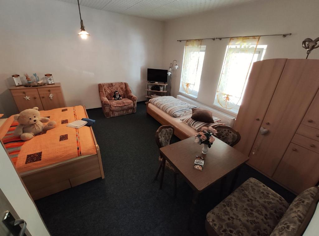 Postel nebo postele na pokoji v ubytování Penzion u Krtka