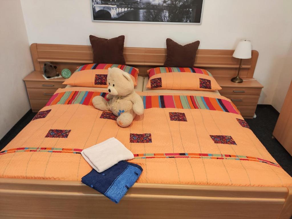 Postel nebo postele na pokoji v ubytování Penzion u Krtka