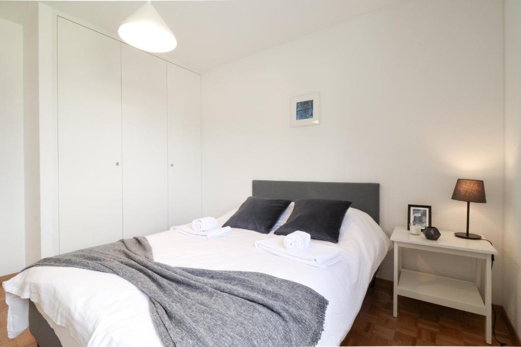 Postel nebo postele na pokoji v ubytování Nice apartment ideally located in Martigny