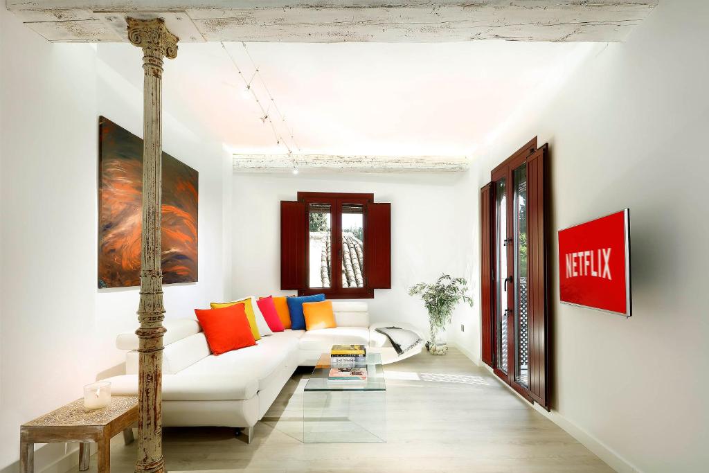 A bed or beds in a room at Art Chapiz Apartments