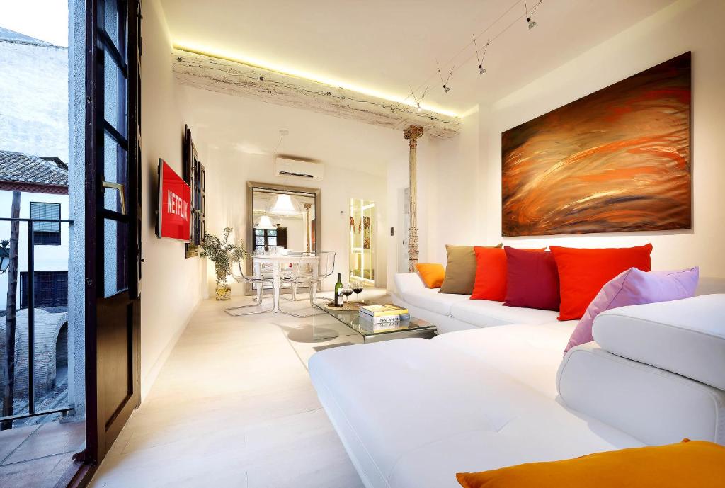 A bed or beds in a room at Art Chapiz Apartments