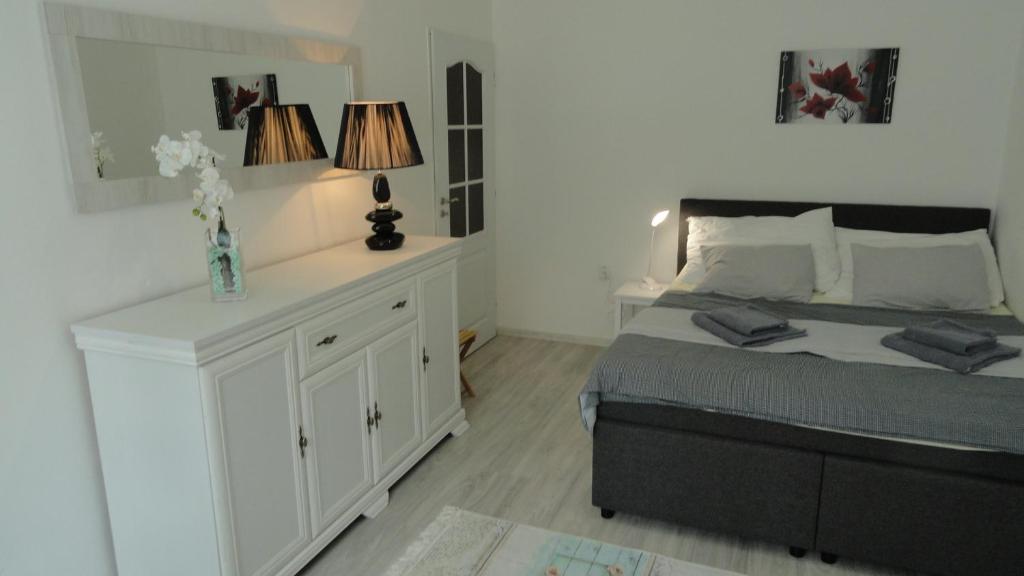 Postel nebo postele na pokoji v ubytování Apartmán Sluka