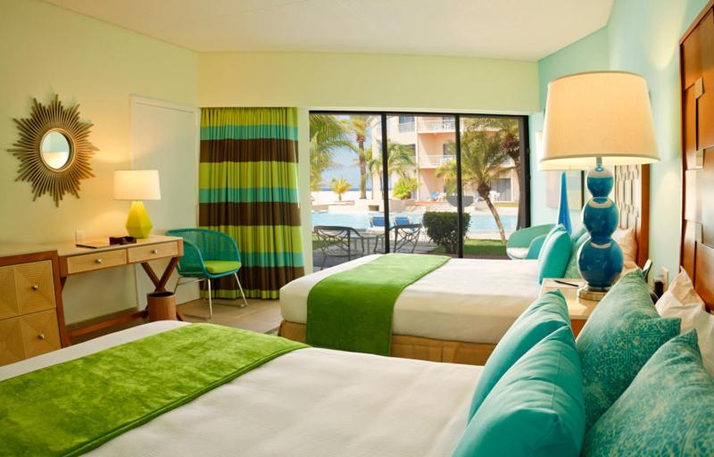 Postel nebo postele na pokoji v ubytování Sunscape Curacao Resort Spa & Casino