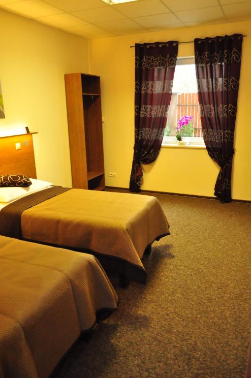 Posteľ alebo postele v izbe v ubytovaní Villa B&B