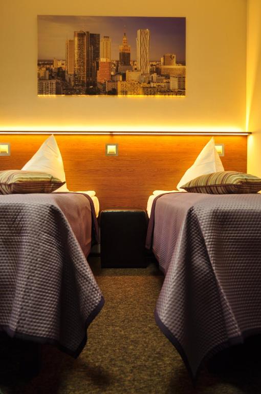 Posteľ alebo postele v izbe v ubytovaní Villa B&B