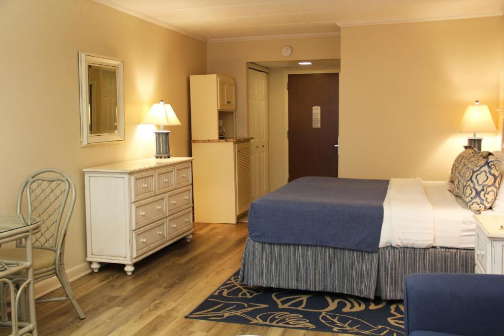 Voodi või voodid majutusasutuse Surf Side Hotel toas