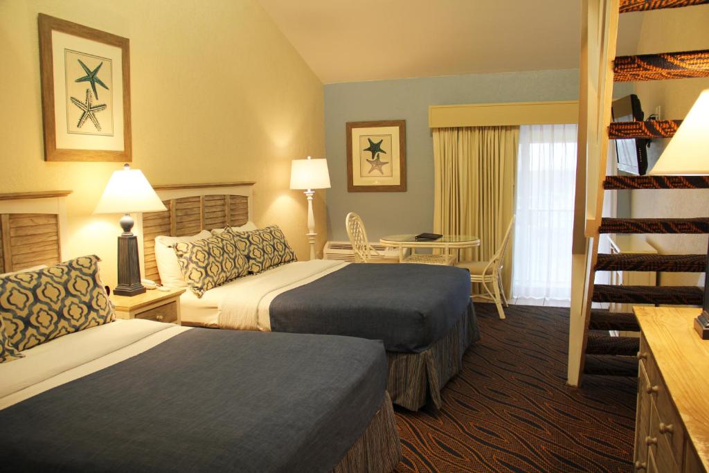 Voodi või voodid majutusasutuse Surf Side Hotel toas