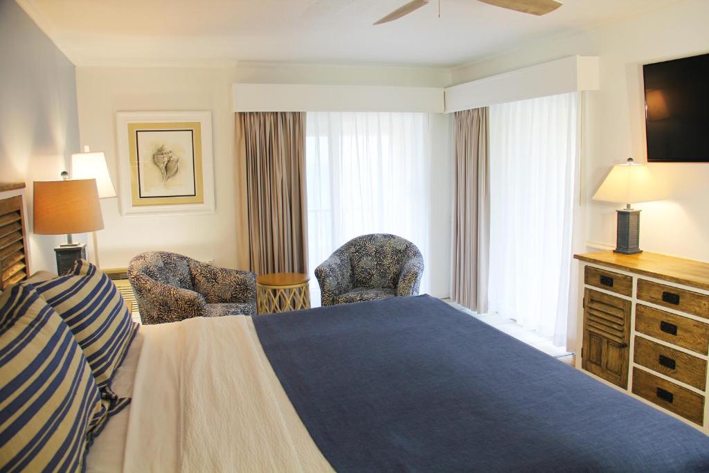 Voodi või voodid majutusasutuse Surf Side Hotel toas