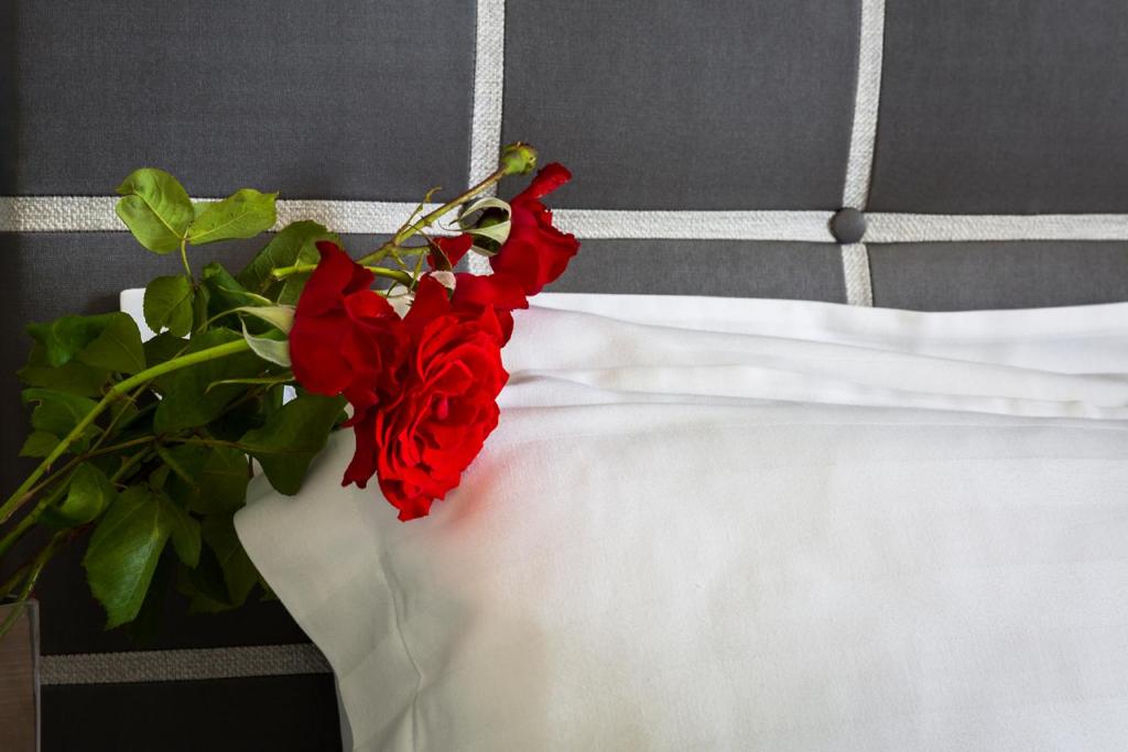 Postel nebo postele na pokoji v ubytování Hotel Porto Koufo
