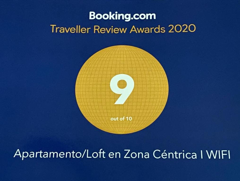 une photo d'un cercle jaune avec le numéro neuf dans l'établissement Apartamento/Loft en Zona Céntrica I WIFI, à Jerez de la Frontera