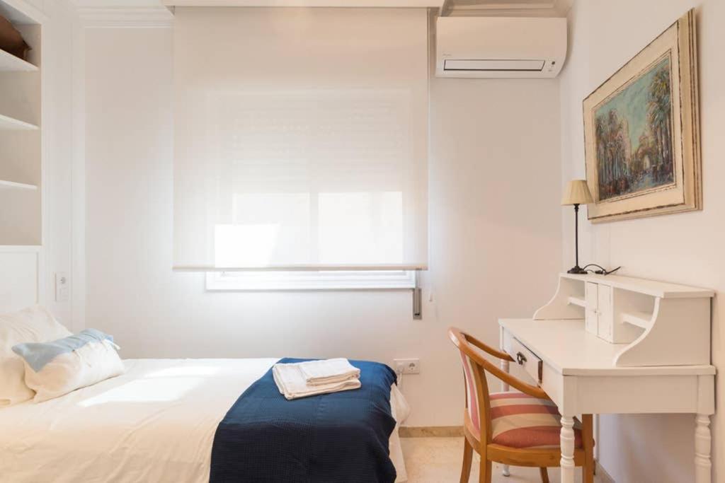 Postel nebo postele na pokoji v ubytování TGH/ Málaga Soho centro