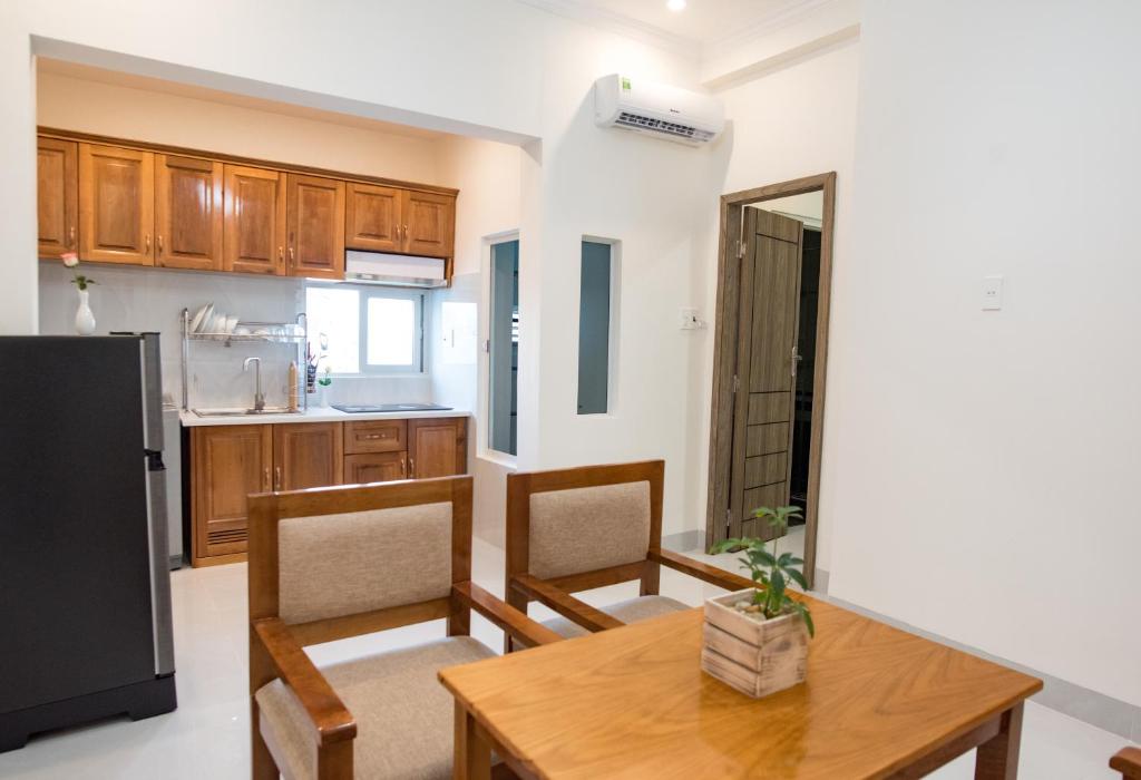 Kuchyň nebo kuchyňský kout v ubytování Amora Hotel & Apartment