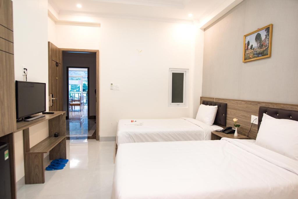 TV a/nebo společenská místnost v ubytování Amora Hotel & Apartment
