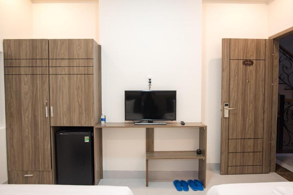 TV a/nebo společenská místnost v ubytování Amora Hotel & Apartment
