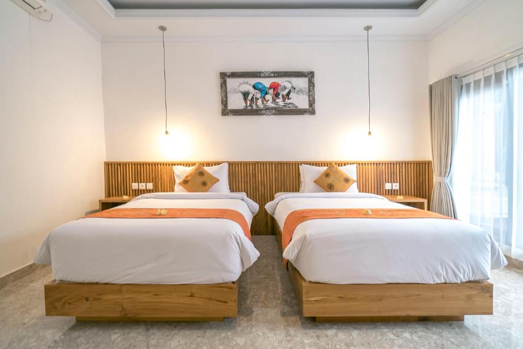Postel nebo postele na pokoji v ubytování Esty House