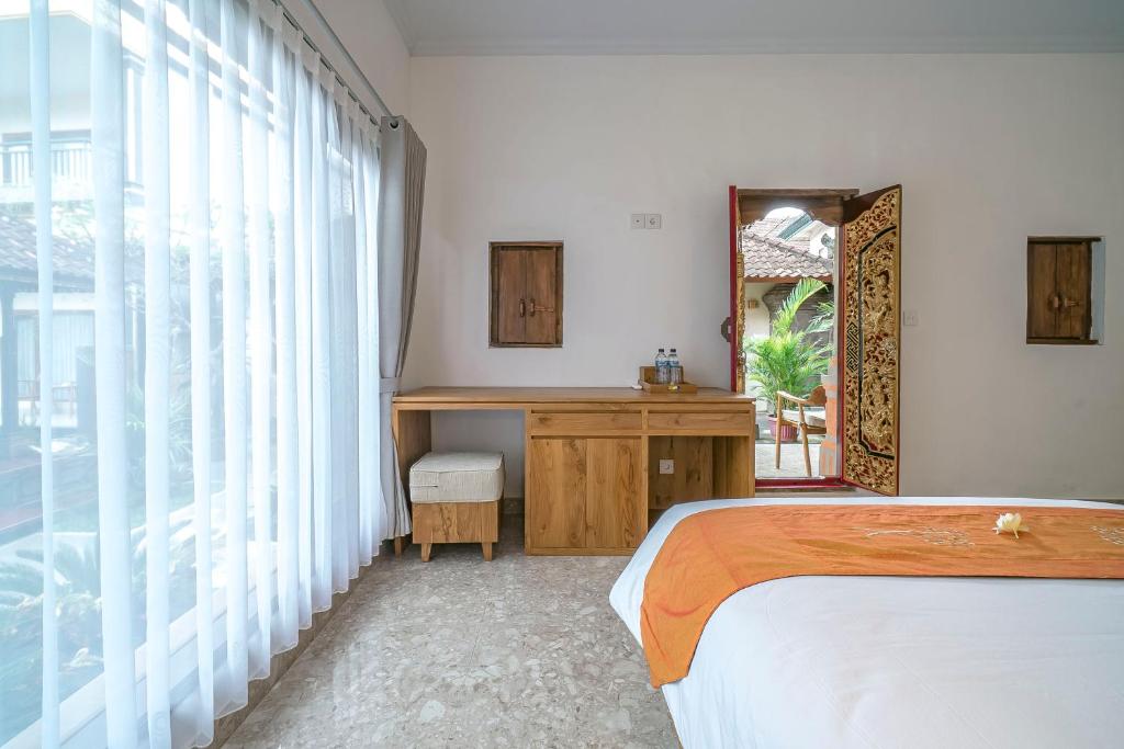 Postel nebo postele na pokoji v ubytování Esty House
