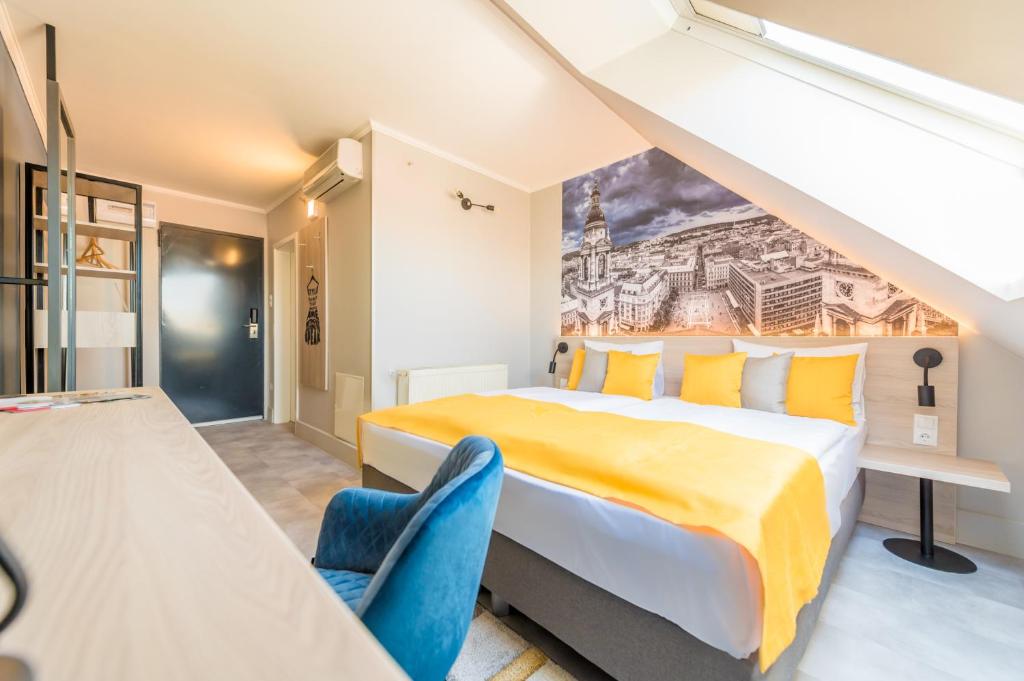 Postel nebo postele na pokoji v ubytování Impulso Fashion Hotel