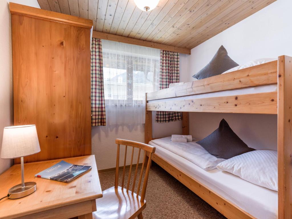 Posteľ alebo postele v izbe v ubytovaní Ferienhaus Gänseblümchen