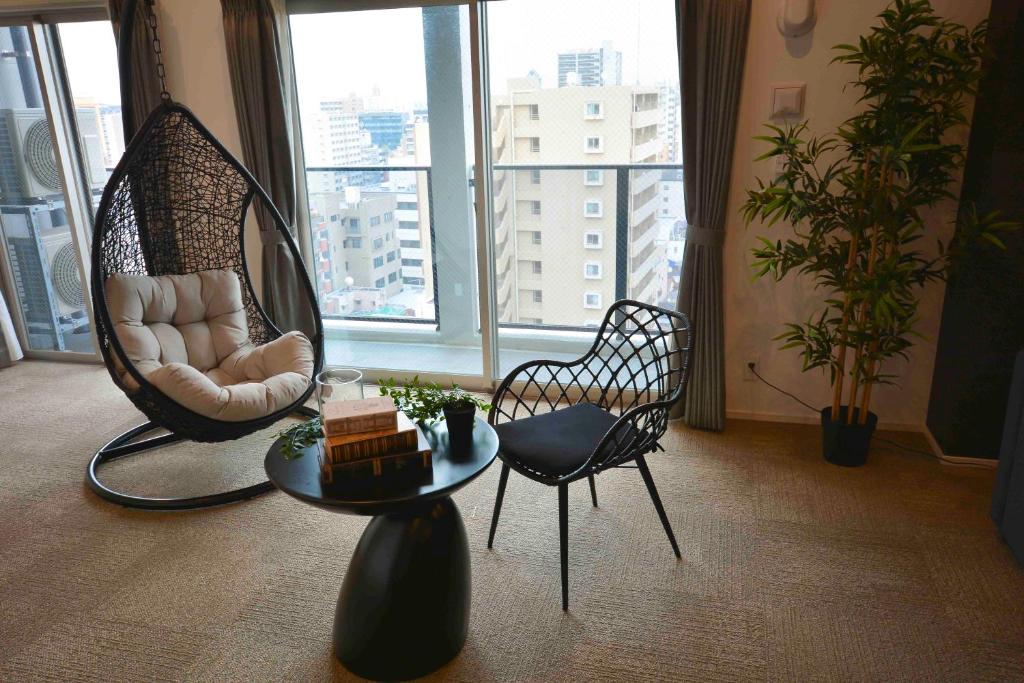 Posezení v ubytování The Grand Residence Hotel Tenjin