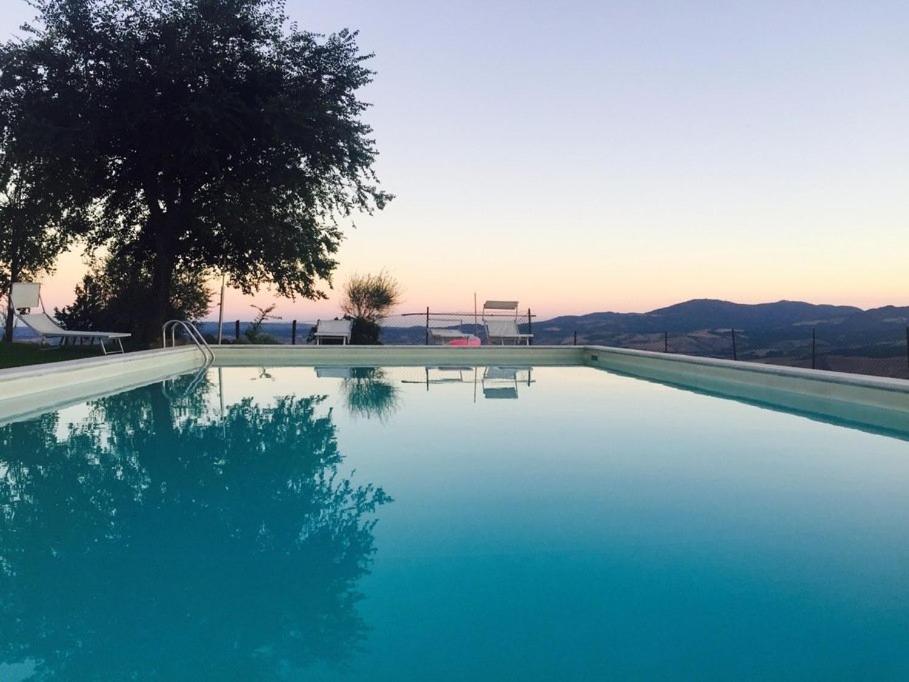 Bazén v ubytování Appartamento Melograno in casale con piscina - Val d'Orcia nebo v jeho okolí