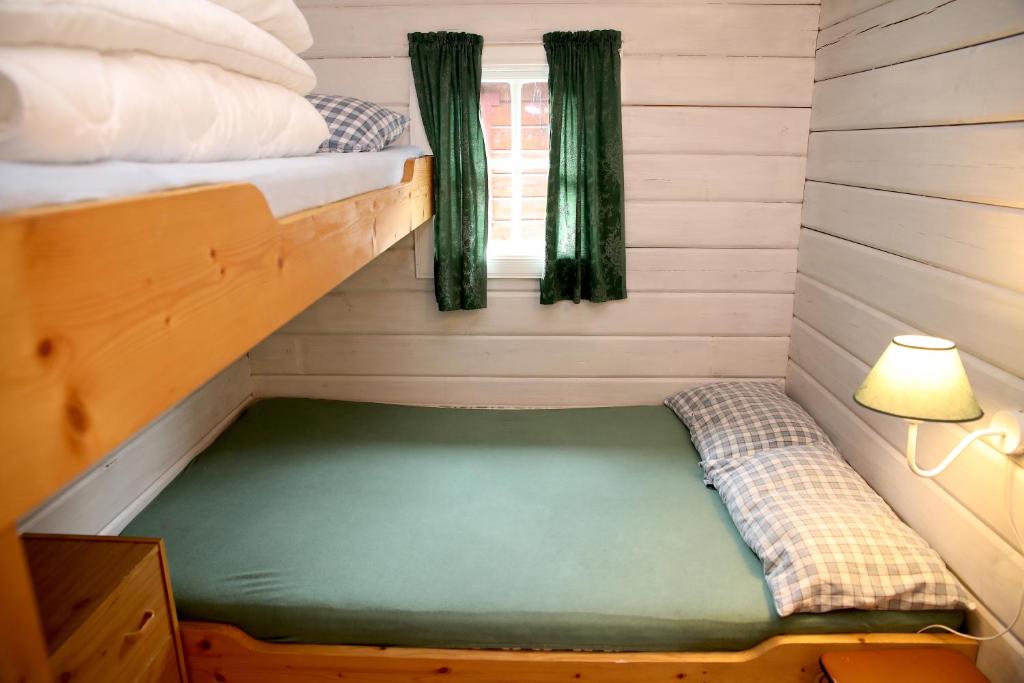 Postel nebo postele na pokoji v ubytování Fossen Accommodation