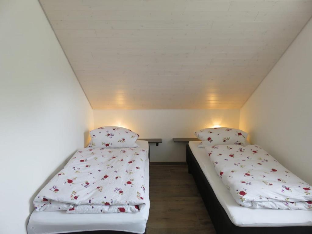 Llit o llits en una habitació de Ferienwohnung Seewaldstraße