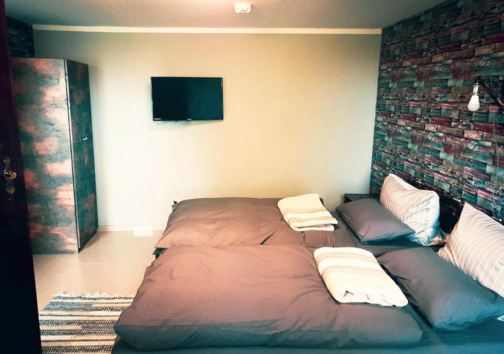 Postel nebo postele na pokoji v ubytování Hotel Geismarburg