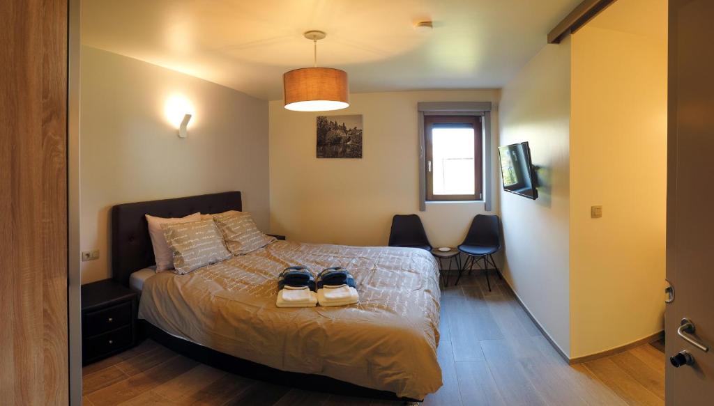 Postel nebo postele na pokoji v ubytování B&B Meulecauter