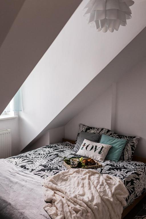 Posteľ alebo postele v izbe v ubytovaní Apartament Dobre Miejsce