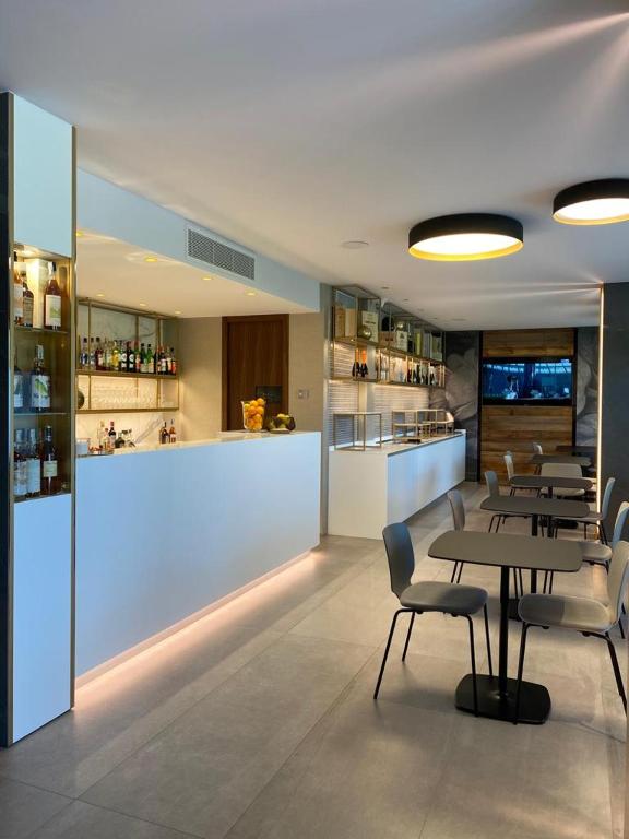 Kuchyň nebo kuchyňský kout v ubytování Iris Hotel