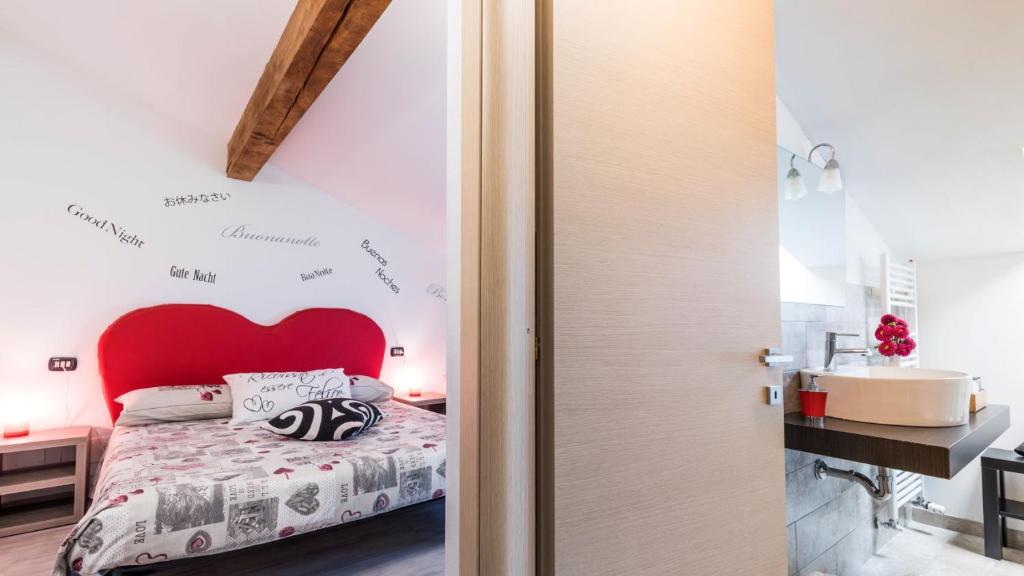 Posteľ alebo postele v izbe v ubytovaní B&B Valtellina Mon Amour