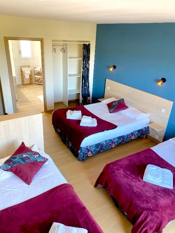 Postel nebo postele na pokoji v ubytování Hôtel Le Plaisance