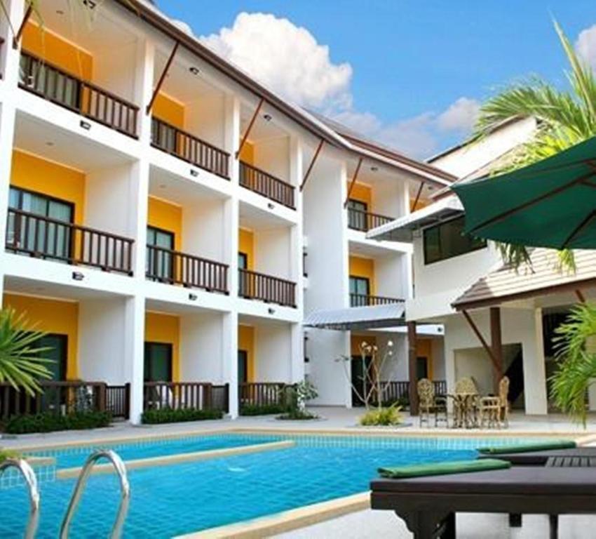 an image of a hotel with a swimming pool at Krabi Cozy Place in Krabi