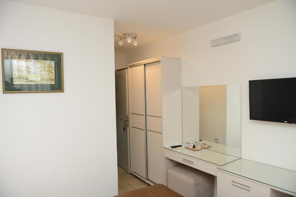 Kuchyň nebo kuchyňský kout v ubytování Hotel Sunce