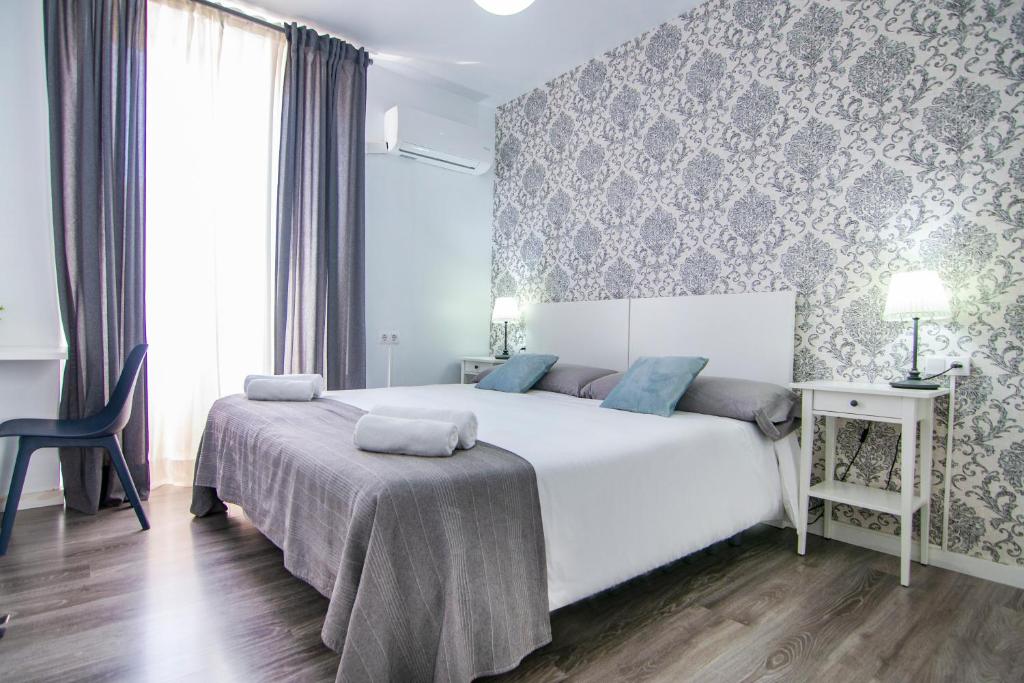Ένα ή περισσότερα κρεβάτια σε δωμάτιο στο Kasa Katia Guest House