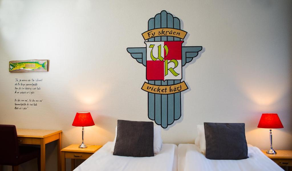 Postel nebo postele na pokoji v ubytování Hotell Hulingen
