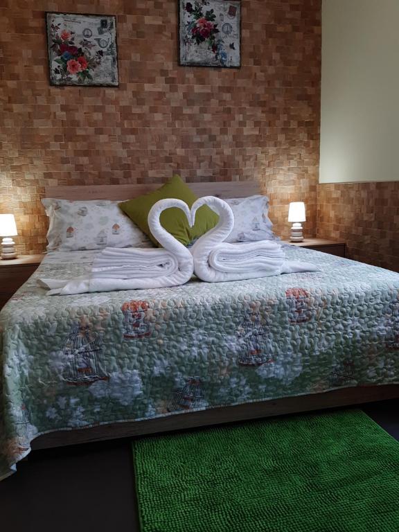 Łóżko lub łóżka w pokoju w obiekcie Villa Marianna Garda Lake